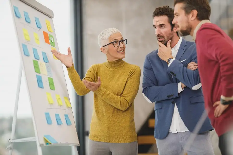 business-team-discussing-project-at-workshop